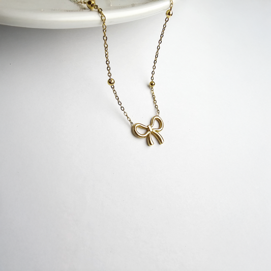 The Elegant Infinity Bow Pendant - Aagrah Jewels™